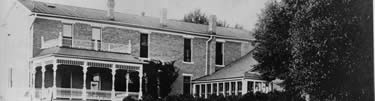 historic view of the Kohrs ranch house from the back